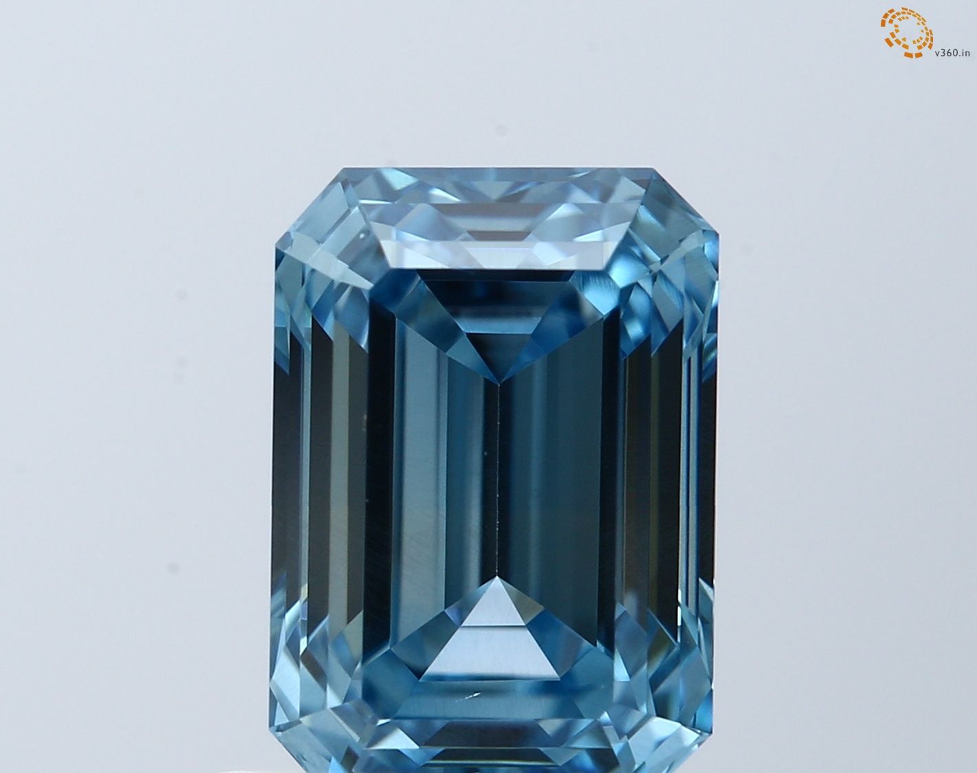 0.91 CT Fancy Vivid Blue EMERALD