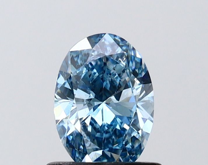 0.73 CT Fancy Vivid Blue OVAL