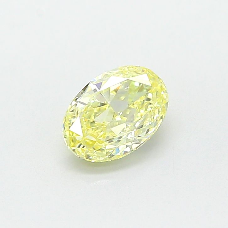 0.65 CT Fancy Yellow OVAL