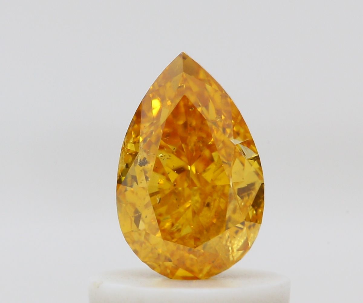 Diament 0.71 ct Fancy Vivid Yellow Orange/I1