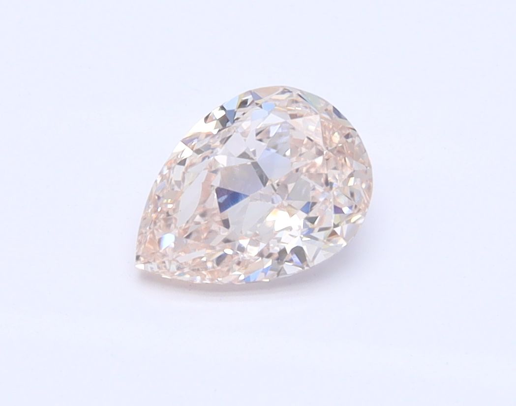 Diament 0.63 ct Fancy Light Orangey Pink/VVS1