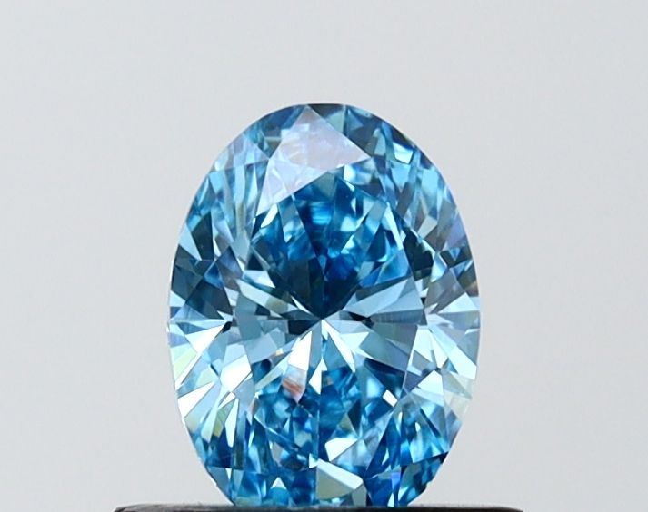 0.74 CT Fancy Vivid Blue OVAL