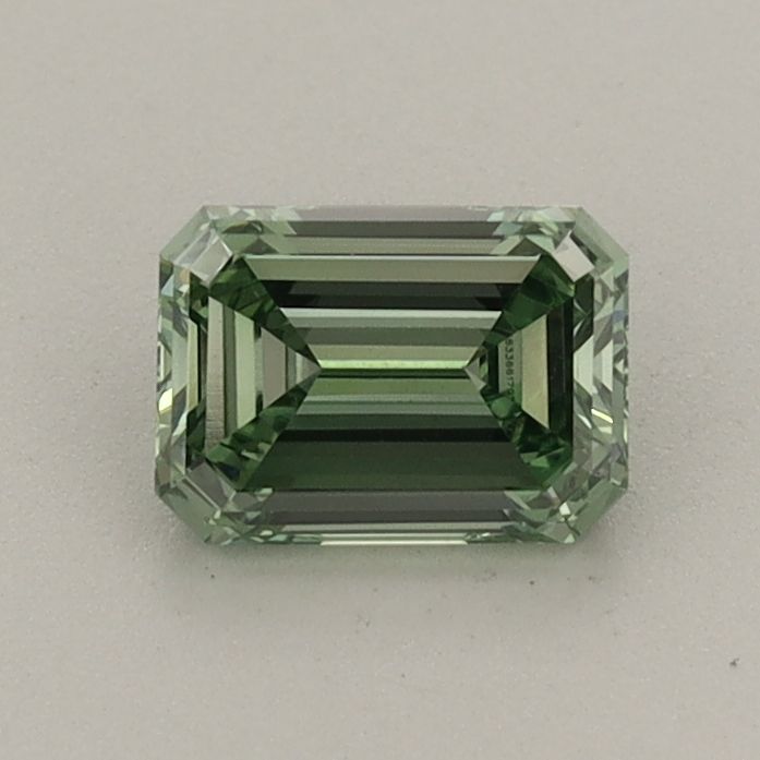 0.69 CT Fancy Vivid Green EMERALD