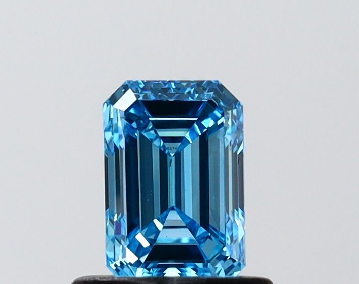 0.73 CT Fancy Vivid Blue EMERALD