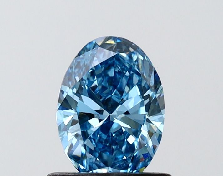 0.74 CT Fancy Vivid Blue OVAL