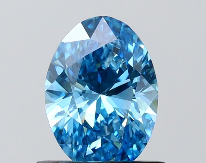 0.99 CT Fancy Vivid Blue OVAL