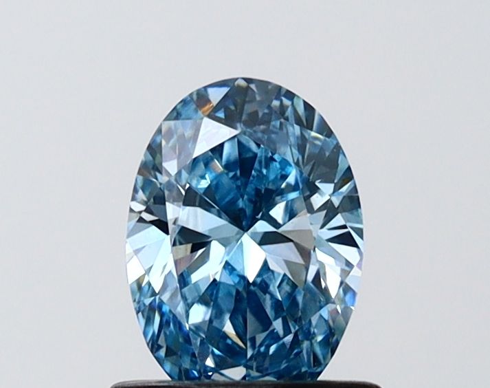 0.74 CT Fancy Vivid Blue OVAL