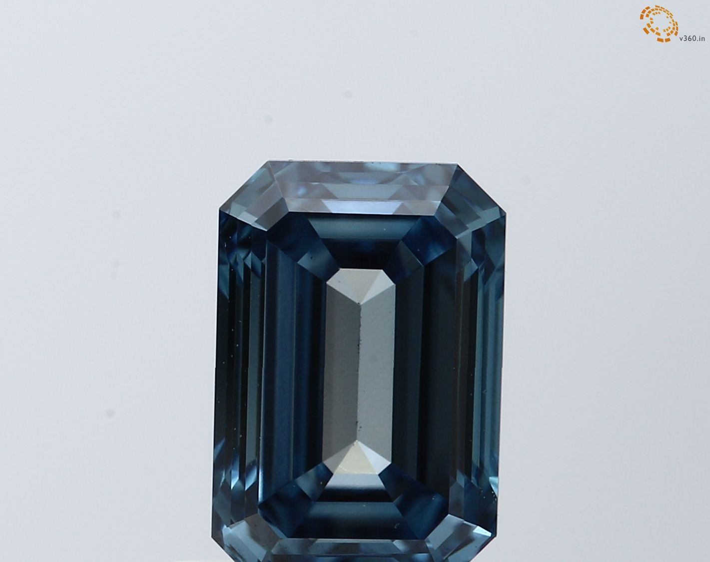 0.65 CT Fancy Intense Blue EMERALD