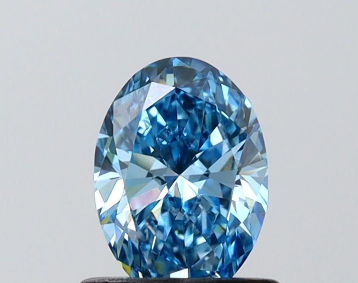 0.74 CT Fancy Vivid Blue OVAL