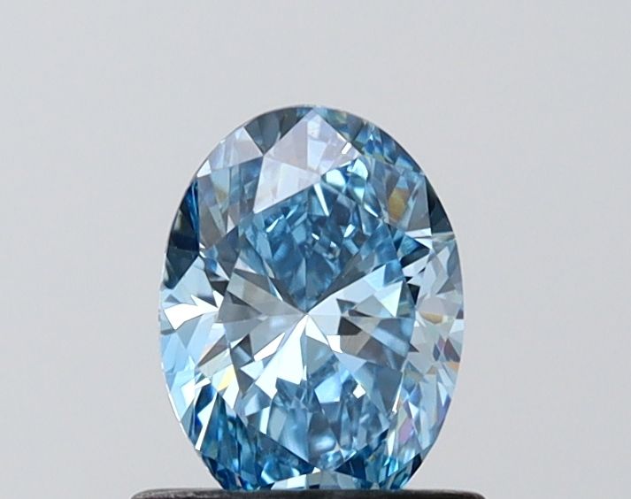 0.74 CT Fancy Vivid Blue OVAL
