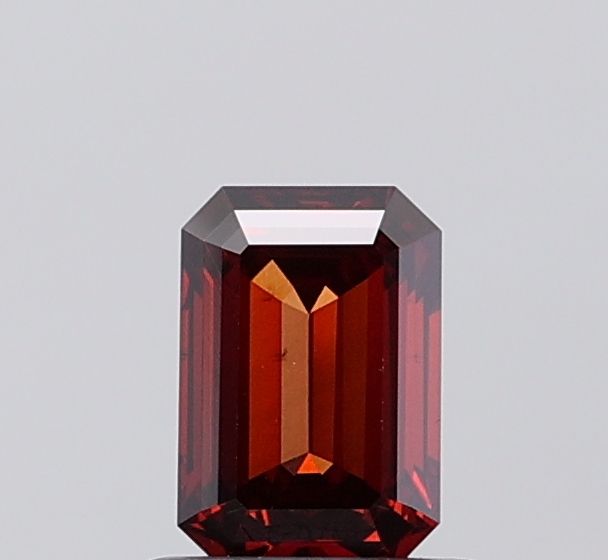 0.64 CT Fancy Deep Orange EMERALD