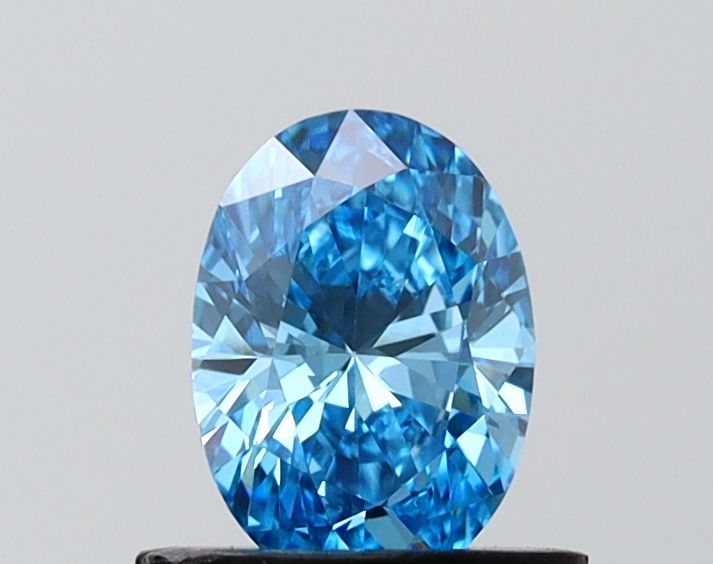 0.74 CT Fancy Vivid Blue OVAL