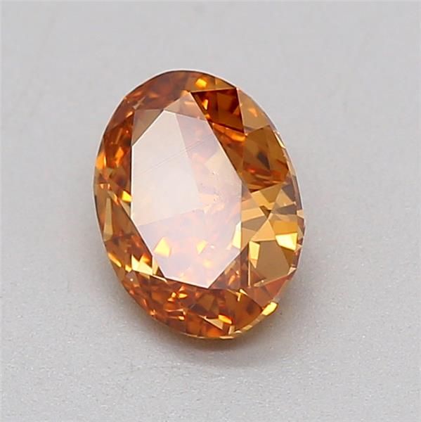 0.5 CT Fancy Vivid Brownish Orange OVAL