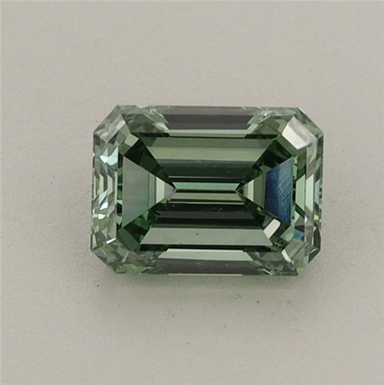 0.72 CT Fancy Vivid Green EMERALD