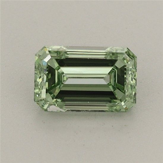 0.73 CT Fancy Vivid Green EMERALD