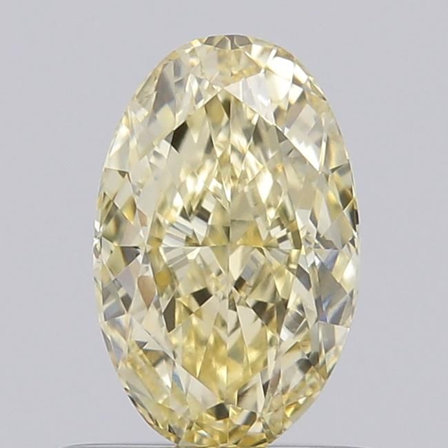0.63 CT Fancy Yellow OVAL