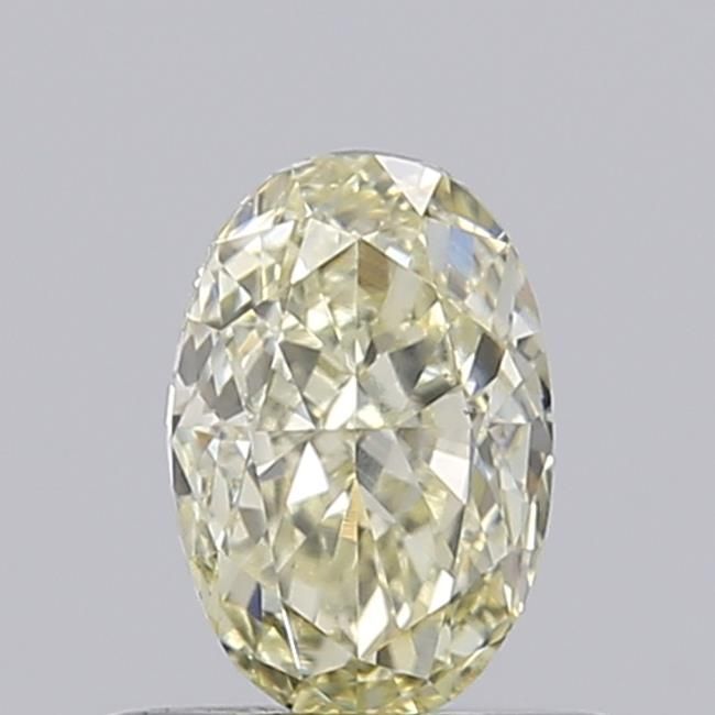 0.58 CT Fancy Light Yellow OVAL