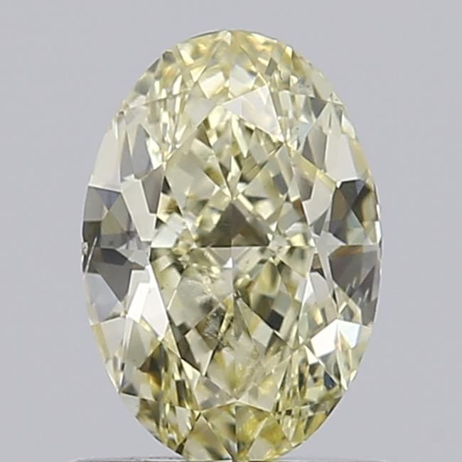 0.83 CT Fancy Light Yellow OVAL