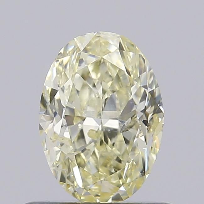 0.7 CT Fancy Light Yellow OVAL