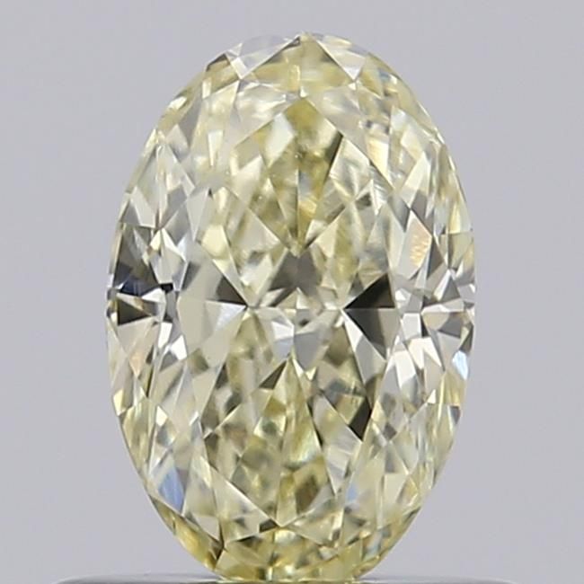 0.59 CT Fancy Light Yellow OVAL