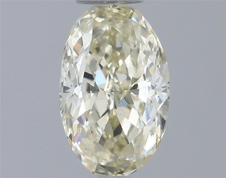 0.57 CT Fancy Light Yellow OVAL