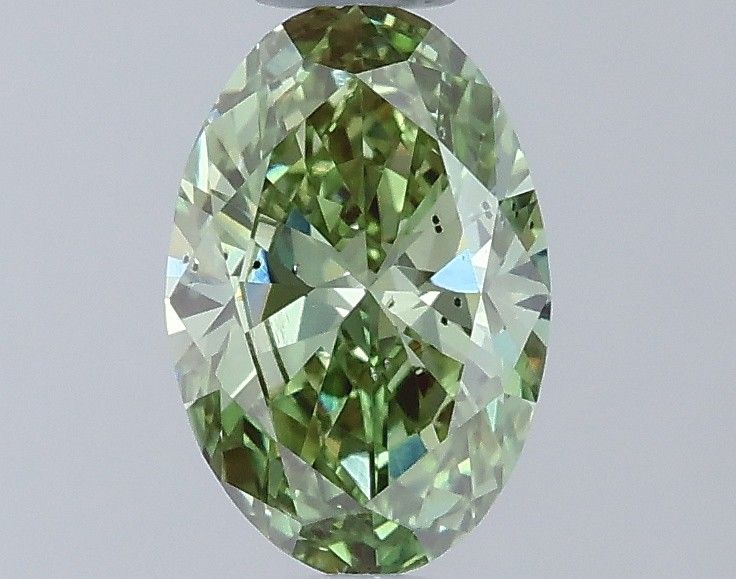 0.59 CT Fancy Vivid Green OVAL