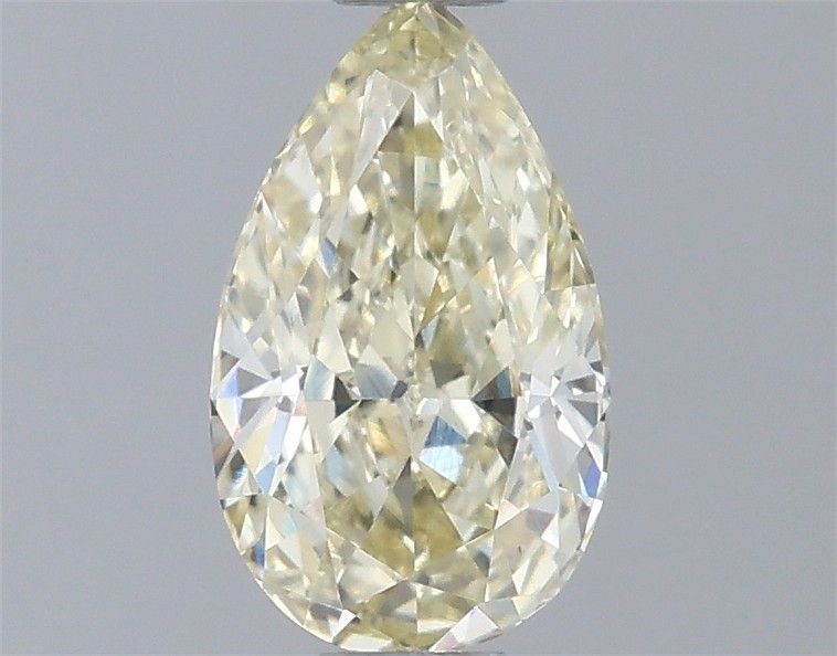 0.64 CT Fancy Yellow PEAR
