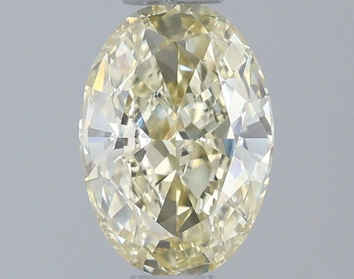 0.7 CT Fancy Yellow OVAL