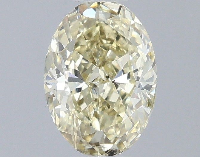 0.51 CT Fancy Light Yellow OVAL