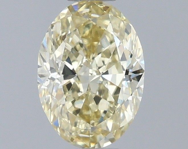0.72 CT Fancy Yellow OVAL
