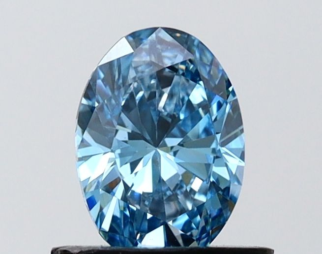 0.74 CT Fancy Vivid Blue OVAL