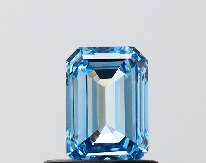 0.68 CT Fancy Vivid Blue EMERALD