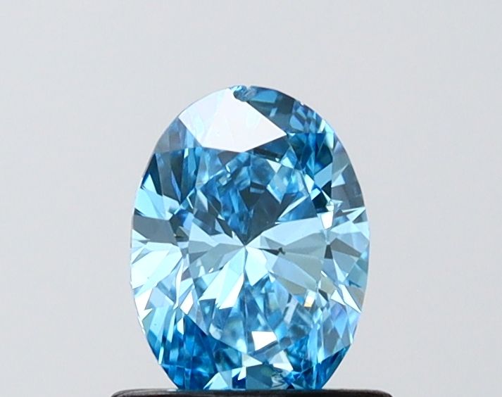 0.69 CT Fancy Vivid Blue OVAL