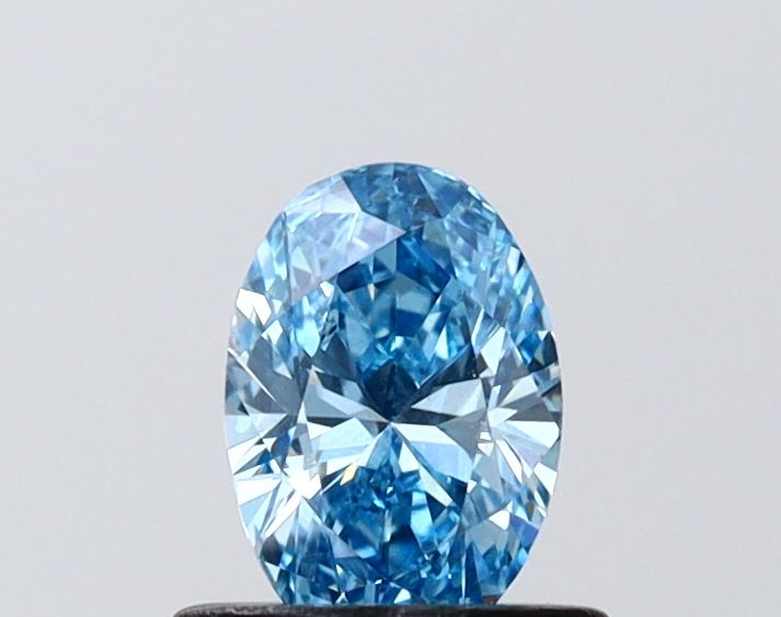0.54 CT Fancy Vivid Blue OVAL
