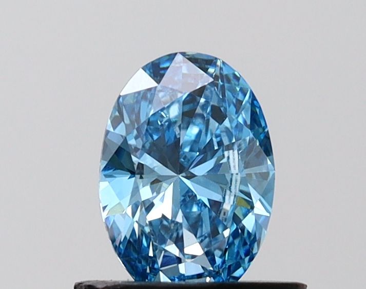 0.72 CT Fancy Vivid Blue OVAL