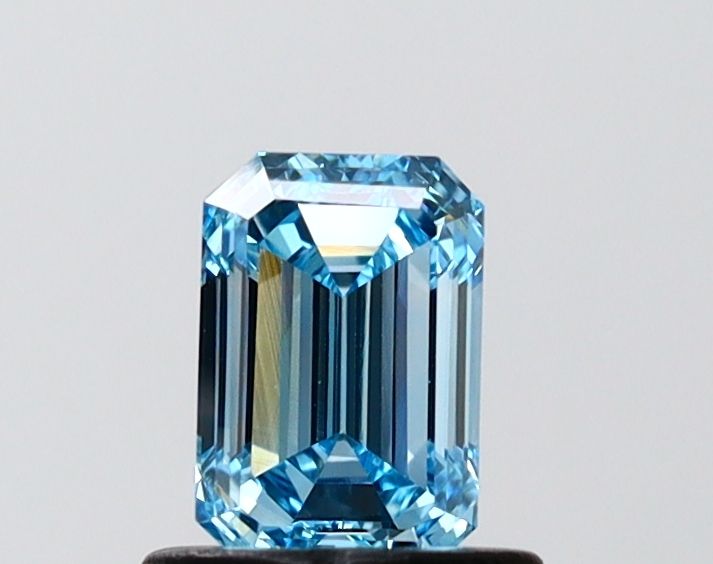 0.73 CT Fancy Vivid Blue EMERALD
