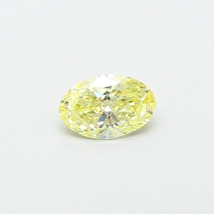 0.65 CT Fancy Yellow OVAL