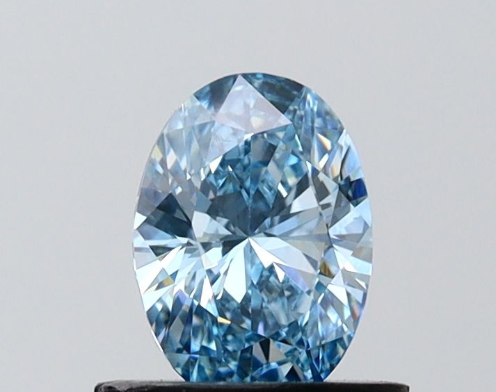 0.73 CT Fancy Vivid Blue OVAL